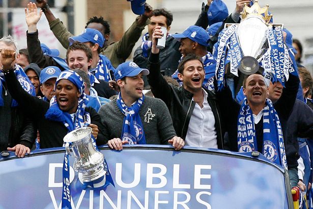 John Terry Frank Lampard Petr Cech and Didier Drogba show off the Premier League Trophy and FA Cup during their victory parade