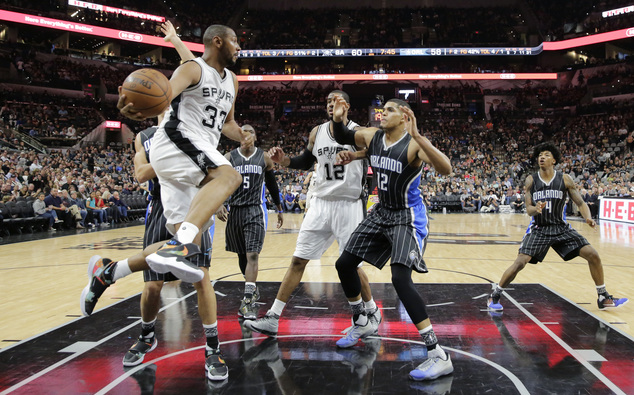 San Antonio Spurs center Boris Diaw looks to pass against the Orlando Magic during the second half of an NBA basketball game Monday Feb. 1 2016 in S