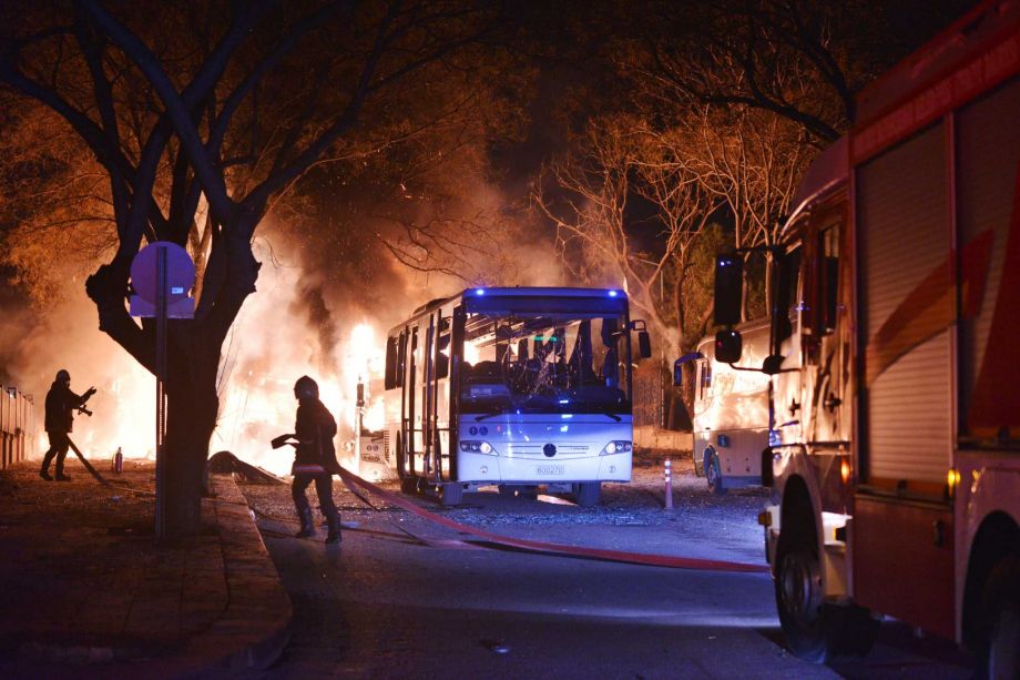 Firefighters work at a scene of fire from an explosion in Ankara Wednesday Feb. 17 2016. A large explosion believed to have been caused by a bomb injured several people in the Turkish capital on Wednesday according to media reports. Private NTV said