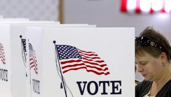 Anna Rogers casts her ballot at the volunteer fire department in Flushing Ohio