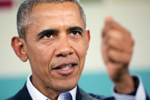 President Barack Obama gestures at a news conference