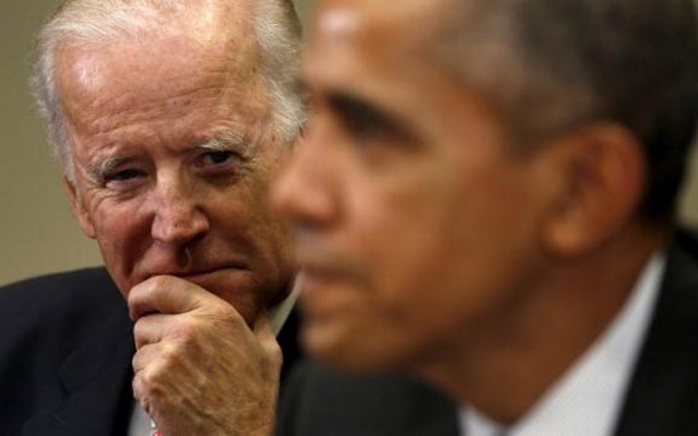 U.S. Vice President Joe Biden listens as President Barack Obama holds a meeting with members of his national security team and cybersecurity advisors on new actions to enhance the nation’s cybersecurity including measures that are outlined in the Presi