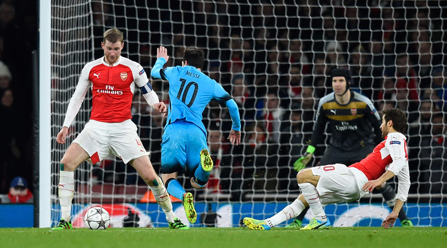 Barcelona's Lionel Messi is fouled by Arsenal's Mathieu Flamini resulting in a penalty to Barcelona