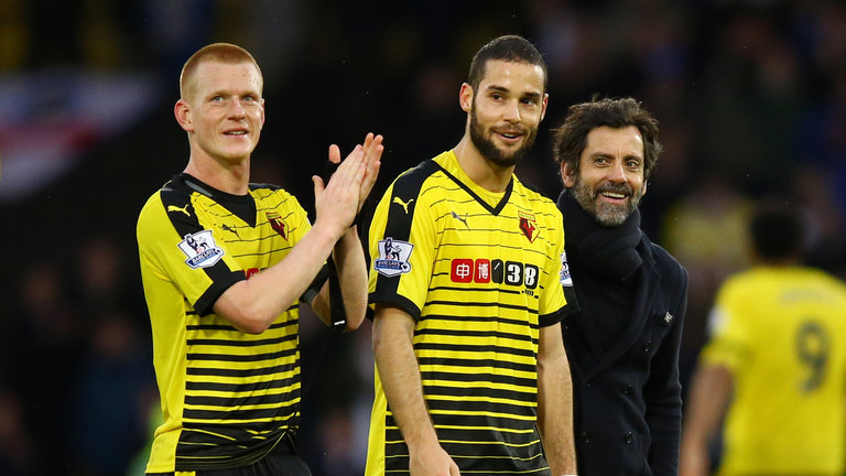 Ben Watson Mario Suarez and manager Quique Sanches Flores celebrate their FA Cup win