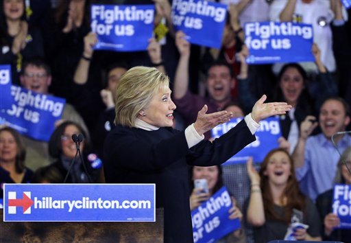 Democratic presidential candidate Hillary Clinton gestures to supporters at her New Hampshire presidential primary campaign rally Tuesday Feb. 9 2016 in Hooksett N.H