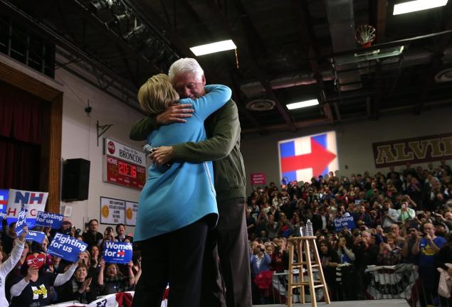 Happy couple? Bill Clinton was a bit too open about his feeling on marriage before introducing his wife Hillary for a campaign speech in Hudson NH