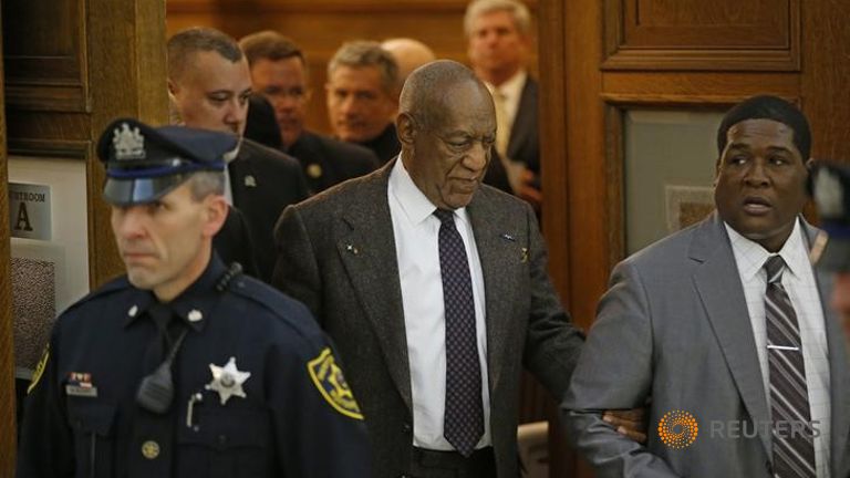 Bill Cosby is led out of Courtroom A in the Montgomery County Courthouse in Norristown Pennsylvania