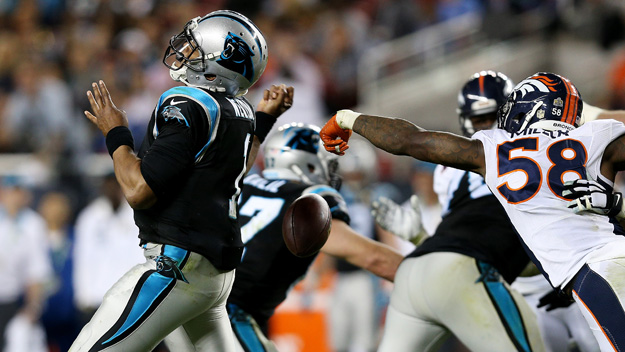 Von Miller of the Denver Broncos strips the ball from Cam Newton of the Carolina Panthers in the fourth quarter of Super Bowl 50 at Levi's Stadium