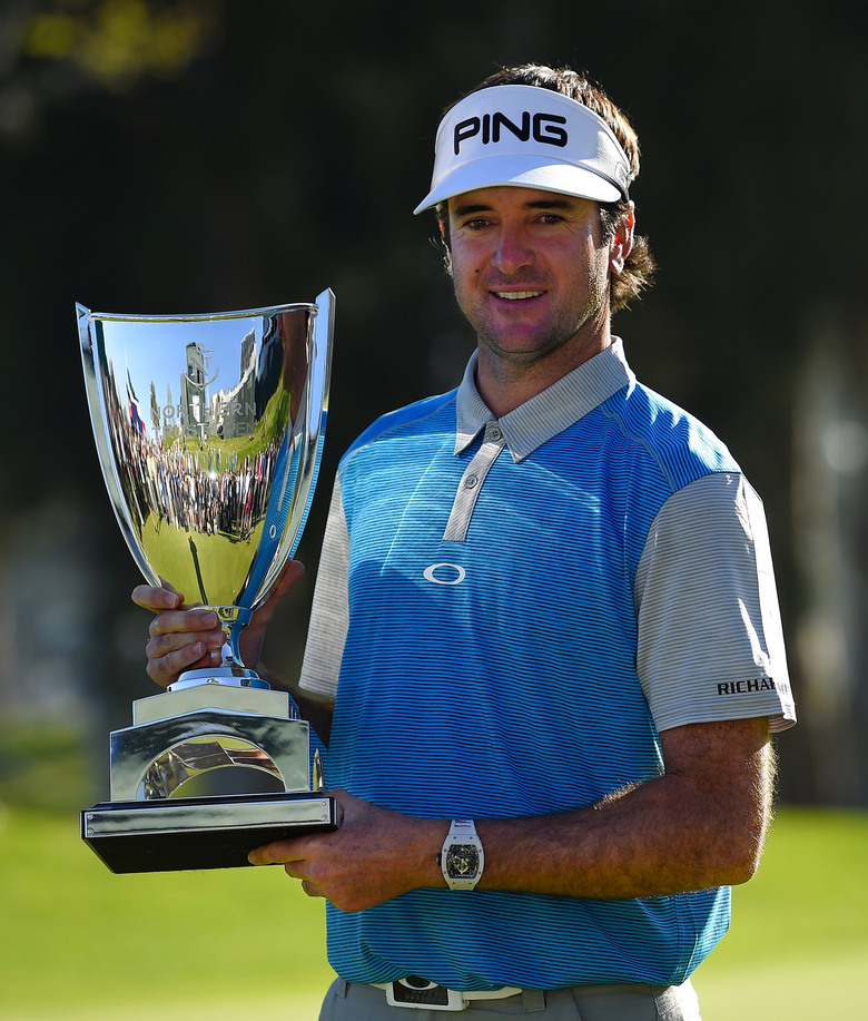 Bubba Watson poses with the trophy Sunday after winning the Northern Trust Open in Los Angeles