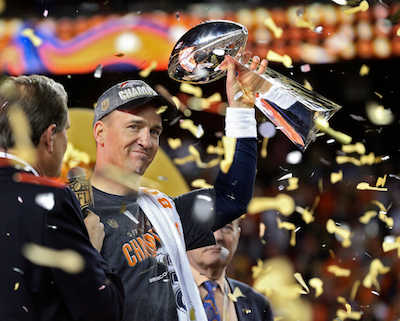 Denver Broncos quarterback Peyton Manning whose mother Olivia is a Philadelphia native with the Vince Lombardi trophy after beating the Carolina Panthers 24-10 Sunday in Super Bowl 50