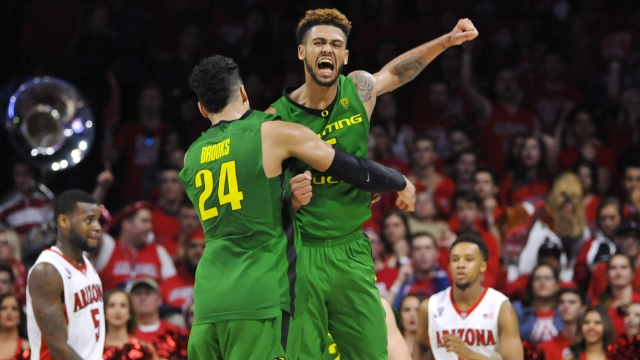 Dillon Brooks and Tyler Dorsey celebrate after taking down Arizona in Tucson