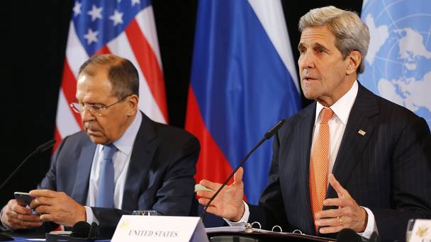 US secretary of state John Kerry right and Russian foreign minister Sergey Lavrov reveal the ceasefire agreement after the International Syria Support Group meeting in Munich