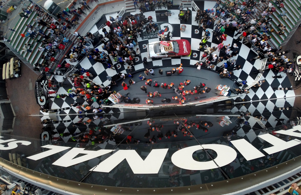 Chase Elliott celebrates in Victory Lane after winning the Xfinity 300 at Daytona International Speedway