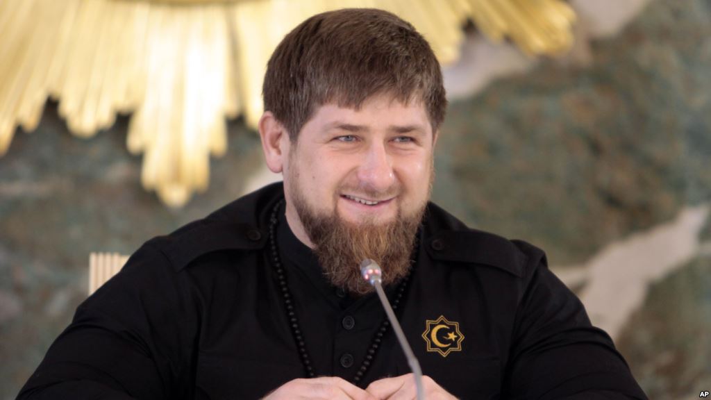 FILE- Chechen regional leader Ramzan Kadyrov speaks to journalists in Chechnya's provincial capital Grozny Russia Dec. 28 2015. Kadyrov has posted a video on the Internet showing Russian opposition politician Mikhail Kasyanov in the cross-hairs