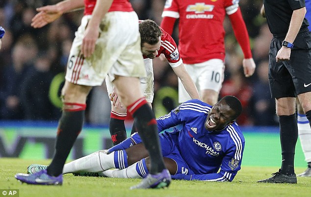 Chelsea defender Kurt Zouma screams in agony after injuring his right knee against Manchester United