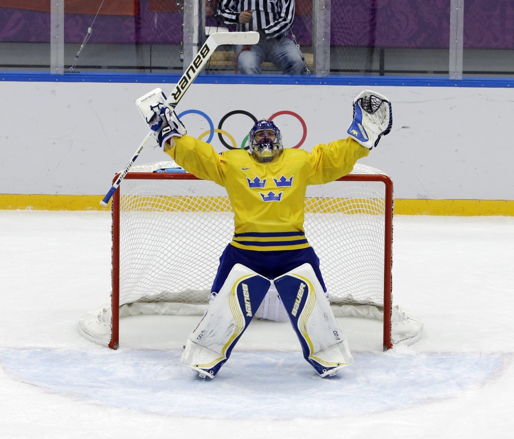 Sweden goaltender Henrik Lundqvist reacts after a men's semifinal ice hockey game against Finland at the 2014 Winter Olympics Friday Feb. 21 2014 in Sochi Russia. Sweden won 2-1 to advance to the gold medal game