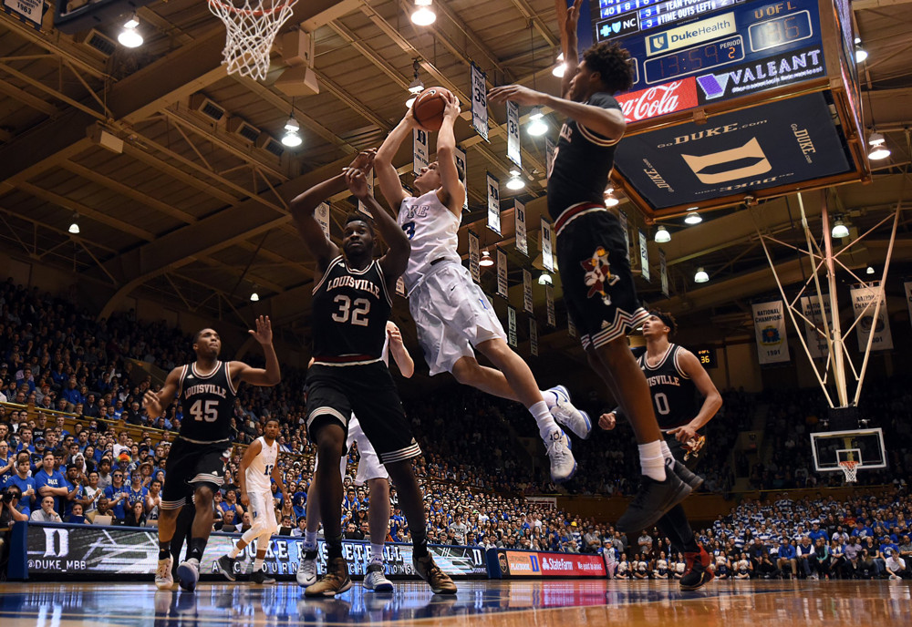 Feb. 8 2016- Durham NC USA- Duke guard Grayson Allen goes in to score as Louisville center Chinanu Onuaku defends during the second half on Monday Jan. 8 2016 at Cameron Indoor Stadium in Durham N.C