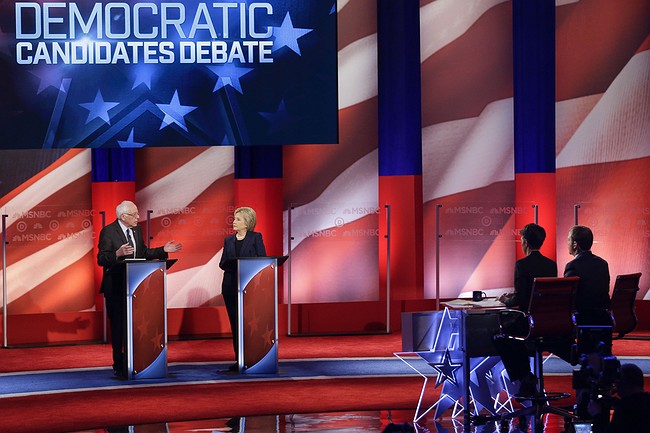 US election: Hillary Clinton and Bernie Sanders in first showdown