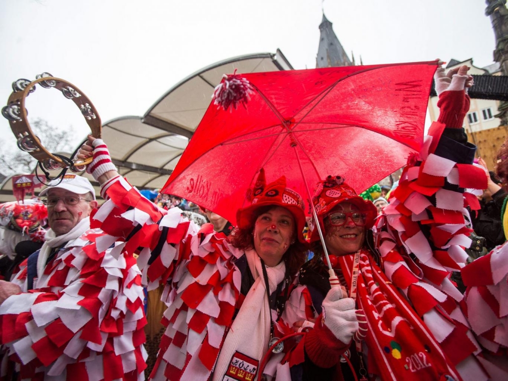 People wearing costumes celebrate carnival in Cologne Germany. The carnival peak season has begun with increased security measures in place following a string of New Year's Eve attacks when scores of women reported to have been sexually harassed and