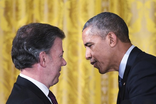 US President Barack Obama and Colombia's President Juan Manuel Santos speak during a reception in the East Room of the White House