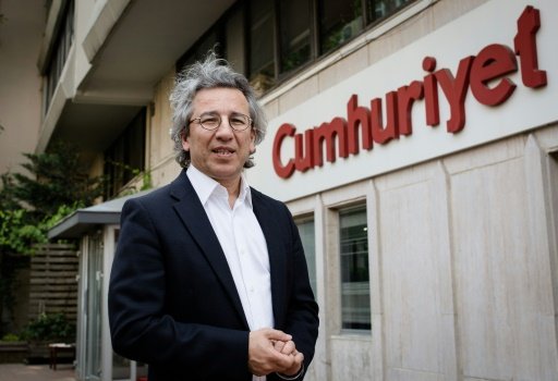 Cumhuriyet  AFP  File | Cumhuriyet editor-in-chief Can Dundar poses outside the newspaper headquarters in Istanbul