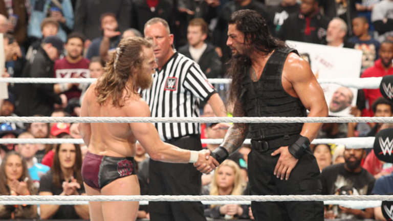 Daniel Bryan and Roman Reigns shake hands after the latter's triumph