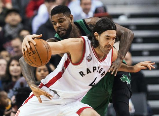 Toronto Raptors forward Luis Scola tries