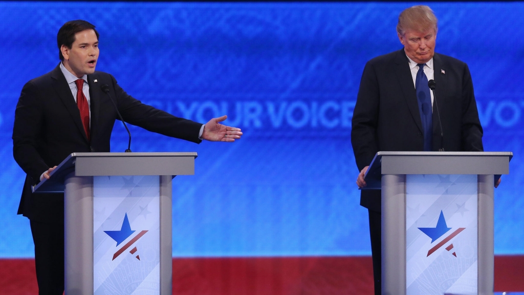 Republican presidential candidates Sen. Marco Rubio and Donald Trump participate in the Republican presidential debate at St. Anselm College Saturday in Manchester N.H