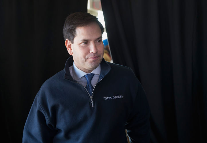 Republican presidential candidate Sen. Marco Rubio leaves a campaign stop on Friday in Muscatine Iowa. Rubio is in Iowa trying to gain support ahead of the state's caucuses