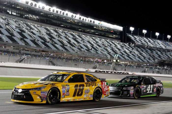 Brothers Kyle Busch and Kurt Busch wait on pit road before going out on the track during a practice session Friday for the NASCAR Sprint Unlimited race Saturday night at Daytona International Speedway in Daytona Beach. AP