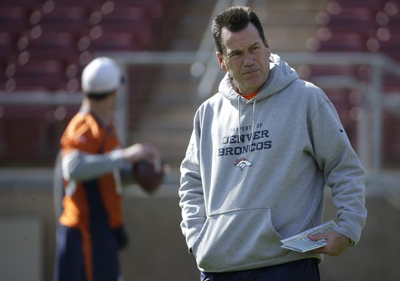 Denver Broncos head coach Gary Kubiak watches players during an NFL football practice in Stanford Calif. Friday Feb. 5 2016