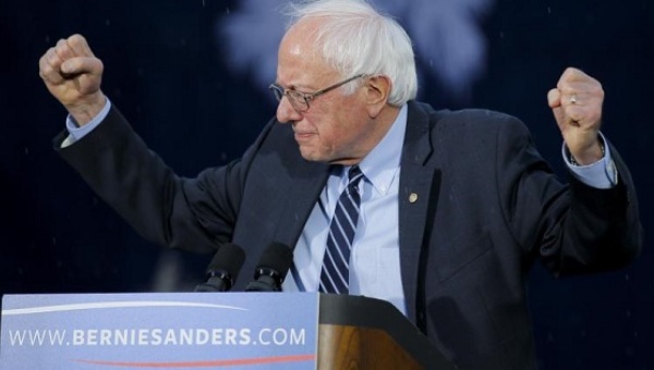 U.S. Democratic presidential candidate Bernie Sanders raises his hands at a campaign rally at the South Carolina Democratic Party headquarters Nov. 21 2015