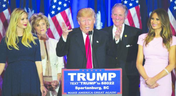 Donald Trump celebrtates his victory in South Carolina with his wife and daughter