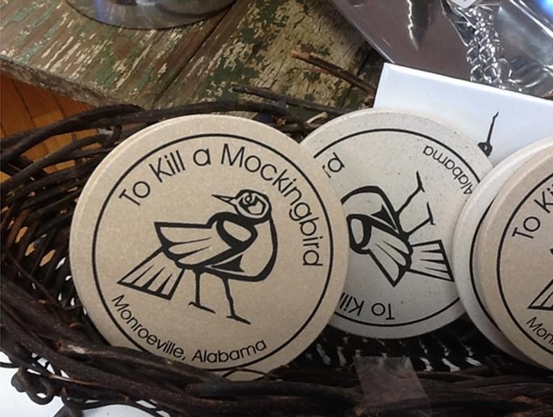 Drink coasters are shown for sale in the gift shop of the Monroe County Heritage Museum in Monroeville Alabama