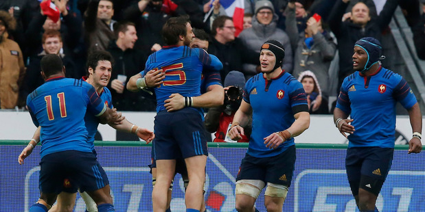 France's Maxime Medar center celebrates after he scores a try with his teammates during a Six Nations tournament Rugby match France against Ireland