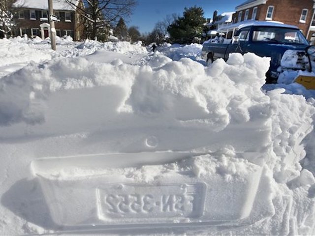 Snow blankets Washington DC in potentially record-setting storm