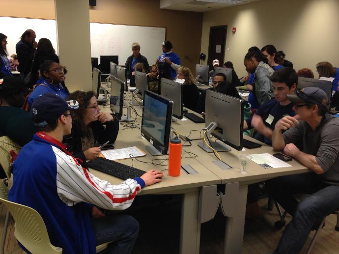 Families sit down to fill out FAFSA information at IU-South Bend during College Goal Sunday