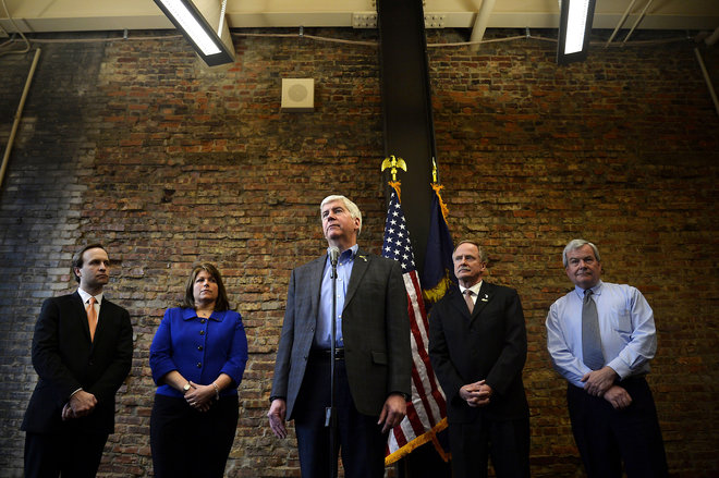 Gov. Rick Snyder reacts while answering questions during a press conference on Wednesday Feb. 17 2016 at Rowe Professional Services in Flint Mich. Snyder announced next steps to identify and replace high-risk high-priority pipes in Flint. Rowe Profes