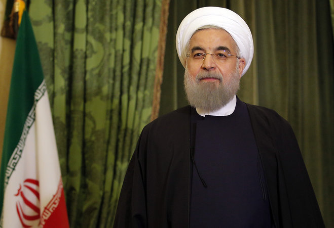 Iranian President Hassan Rouhani waits before a meeting with French Senate President Gerard Larcher in Paris Wednesday Jan. 27 2016. Rouhani says his first visit to Europe since the nuclear accord was signed has proven that there are'great possibilit