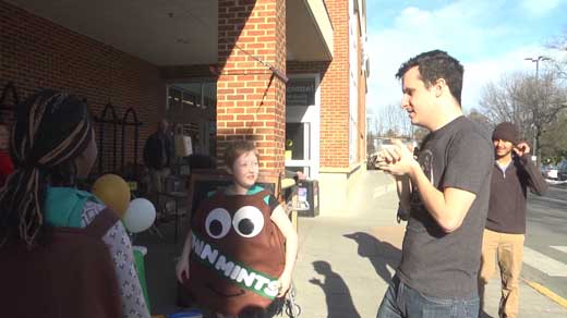 Girl Scouts selling cookies in front Barrack's Road