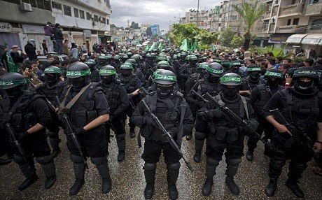 Hamas gunmen at a military parade to commemorate the 27th anniversary of the group. AP