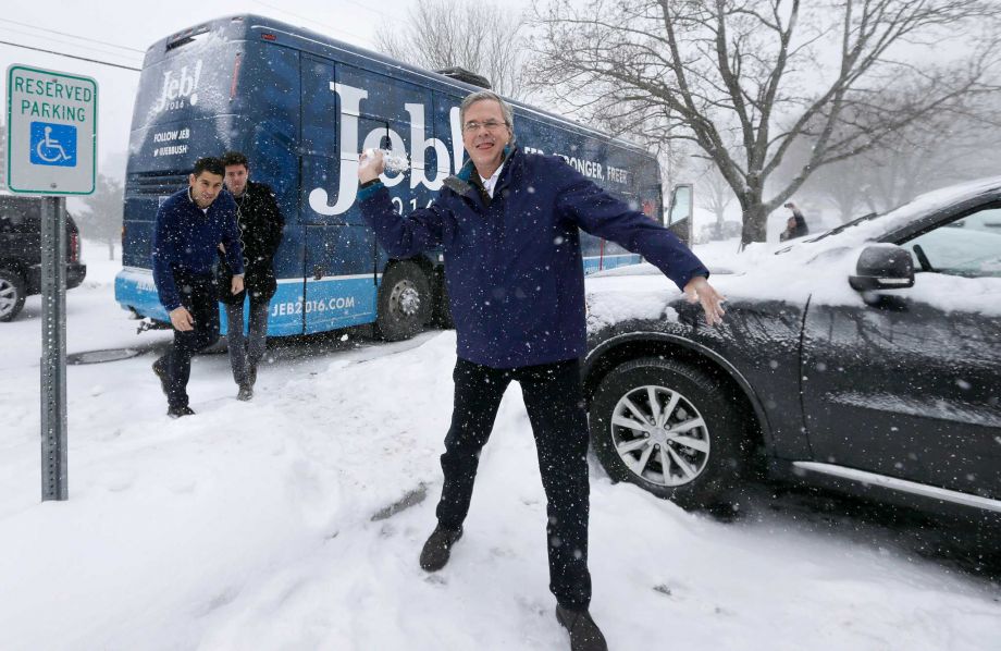 Republican presidential candidate former Florida Gov. Jeb Bush throws a snowball following a campaign event Monday Feb. 8 2016 in Nashua N.H