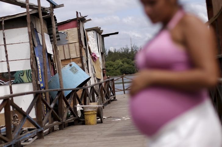 Lediane da Silva who is eight months pregnant is seen in the shanty town of Beco do Sururu Recife Brazil