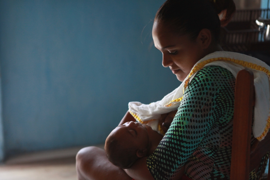 Oxitec- a subsidiary of the biotech firm Intrexon- is working to control the mosquito-borne Zika virus outbreak in Brazil with its genetically modified mosquitoes. Rafela Santos is seen here holding her son Luiz Felipe. Her son was born with microceph