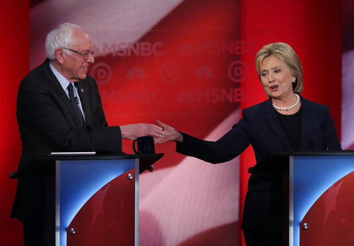 Democratic presidential candidates former Secretary of State Hillary Clinton and U.S. Sen. Bernie Sanders shake hands during their MSNBC Democratic Candidates Debate at the University of New Hampshire on Feb. 4 2016 in Durham New Hampshire