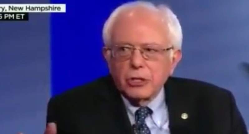 Sen. Bernie Sanders speaks to Anderson Cooper during a Democratic Party town hall event on Feb. 3 2016