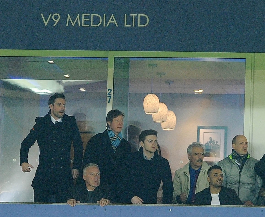 Hollywood screenwriter Adrian Butchart watches from Vardy’s private box