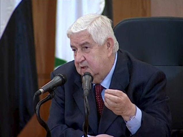 Syrian Foreign Minister Walid al Moualem speaks during a news conference at the Syrian Foreign Ministry in Damascus in this still image taken from video shot