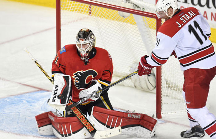 Hurricanes’ center Jordan Staal tries to score on Calgary Flames’ goalie Karri Ramo at Scotiabank Saddledome Wednesday. — Reuters