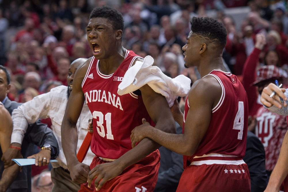 Indiana Hoosiers center Thomas Bryant and Indiana Hoosiers guard Robert Johnson celebrate on the bench during the Crossroads Classic NCAA basketball game between the Indiana Hoosiers and Notre Dame Fighting Irish at Bankers Lif